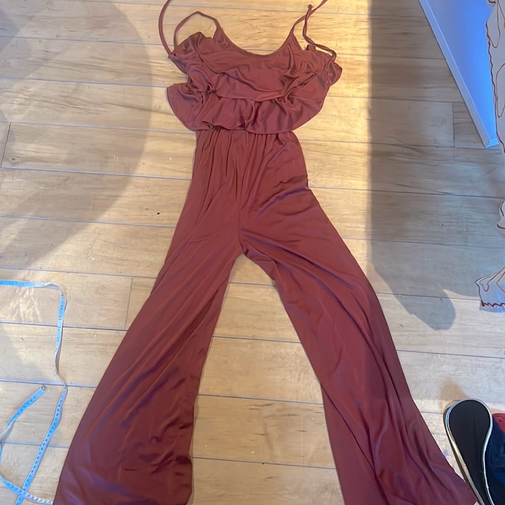 Wine coloured jumpsuit. Great condition.